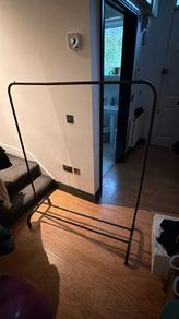 Black metal clothes rack like new