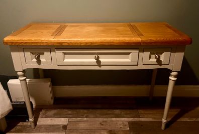 Dressing table with flip-top mirror