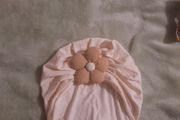 cream turban style baby hat