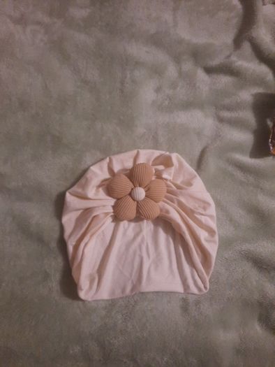 cream turban style baby hat
