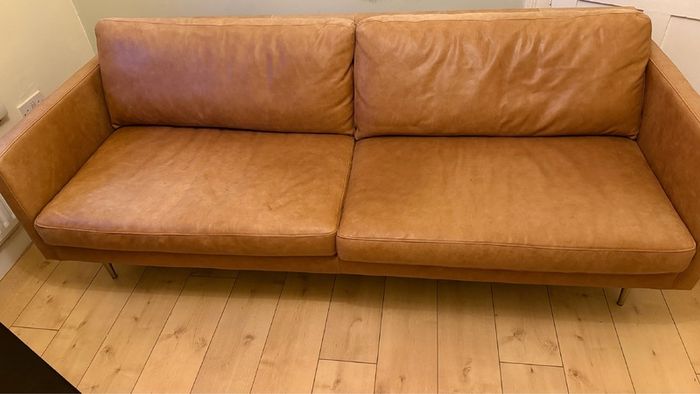 Three seater contemporary tan leather sofa