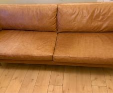 Three seater contemporary tan leather sofa