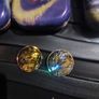 Three Pokemon tins with two coins. Image 5