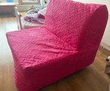 Pink IKEA chair bed