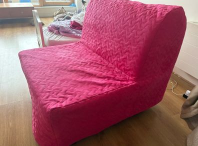 Pink IKEA chair bed