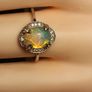 Ethiopian Welo Opal and Lab Grown Diamond Oval Cluster Ring. Image 2