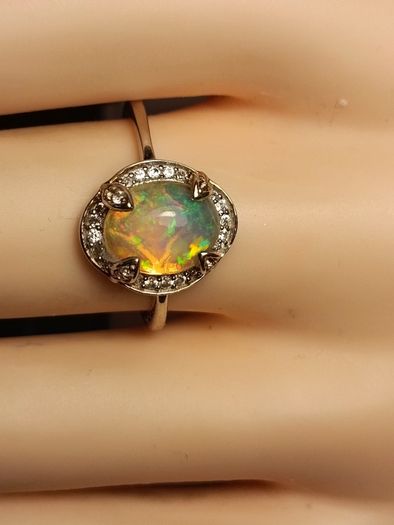 Ethiopian Welo Opal and Lab Grown Diamond Oval Cluster Ring.