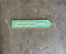 Branded post office sign