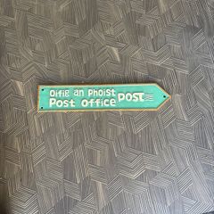 Branded post office sign