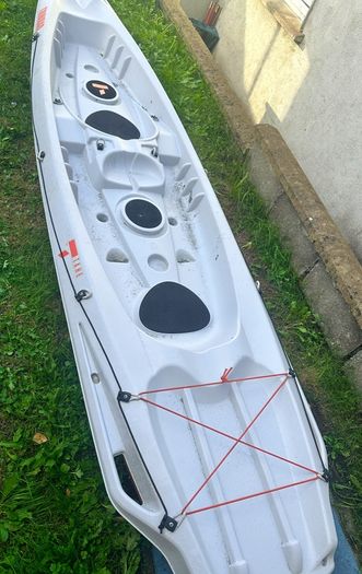 2+1 family sit on kayak