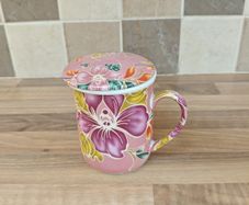 Teacup with Strainer and Spoon
