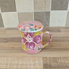 Teacup with Strainer and Spoon