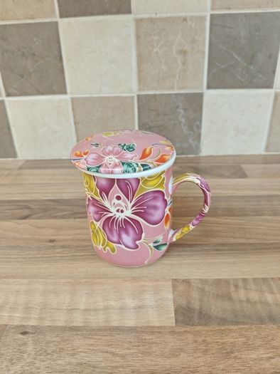 Teacup with Strainer and Spoon