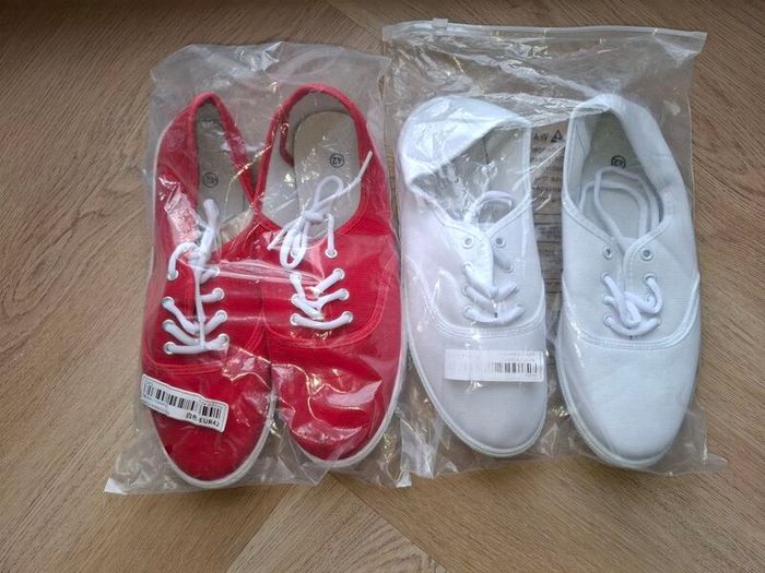 2 pairs.Canvas shoes red and white