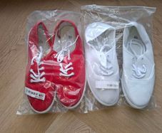 2 pairs.Canvas shoes red and white
