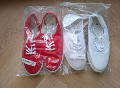 2 pairs.Canvas shoes red and white