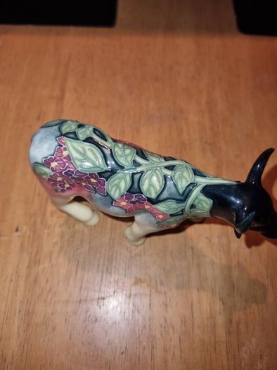 Porcelain colorful cow figurine