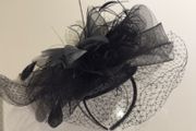 Fascinator in black.