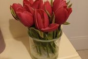 Faux pink  tulip posy in glass vase