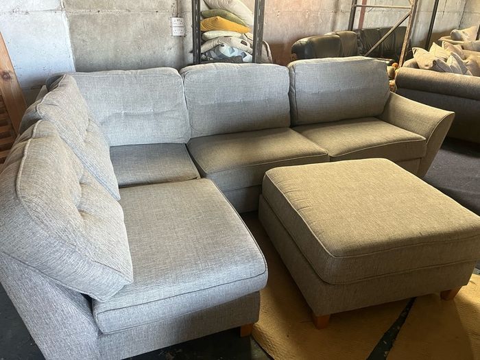 grey corner sofa with matching footstool couch