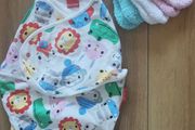 FISHER PRICE Swaddle + 3 pair of socks