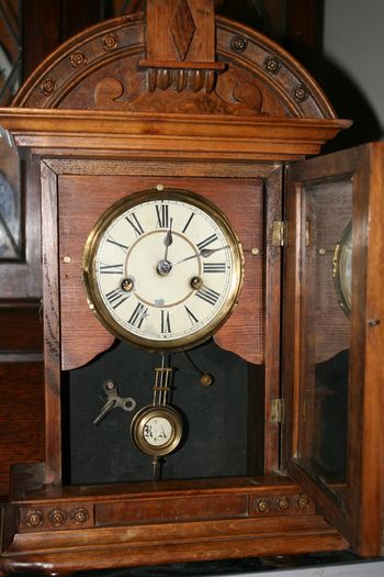 Antique Wood Carved P.H. S. 1800s Mantel Clock (in working order -  the clock doesn't ring) 21,5" x 11"