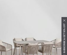 Sklum glass table and four coushioned chairs unwanted gift still in the box