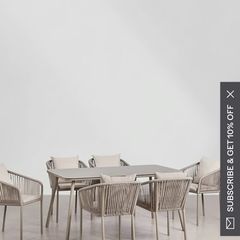 Sklum glass table and four coushioned chairs unwanted gift still in the box