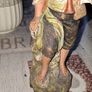 Old Painted Terracotta of a Young Country Boy Holding a Flute, standing on a rocky base. It resembles late 19th- or early 20th-century European decorative sculptures, such as pieces produced by makers like Goldscheider Image 3