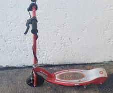 red Razor E100 motorized electric scooter