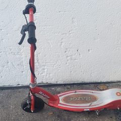 red Razor E100 motorized electric scooter