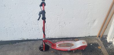 red Razor E100 motorized electric scooter