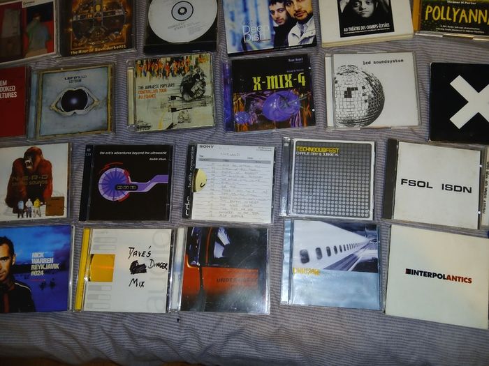 Collection of 58 assorted music CDs