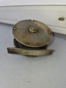 old  brass  fishing real