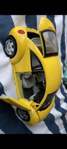 Yellow Volkswagan beetle model car