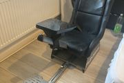 Simulation racing rig for car games and a steering wheel