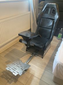Simulation racing rig for car games and a steering wheel