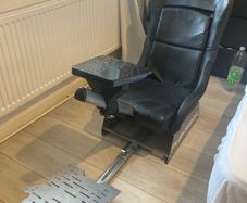 Simulation racing rig for car games and a steering wheel