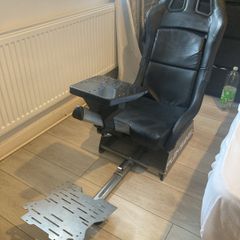 Simulation racing rig for car games and a steering wheel