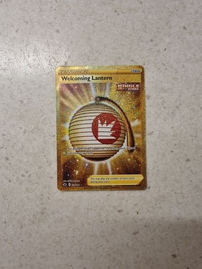 Welcoming Latern Gold Secret Rare Trainer Pokemon Card