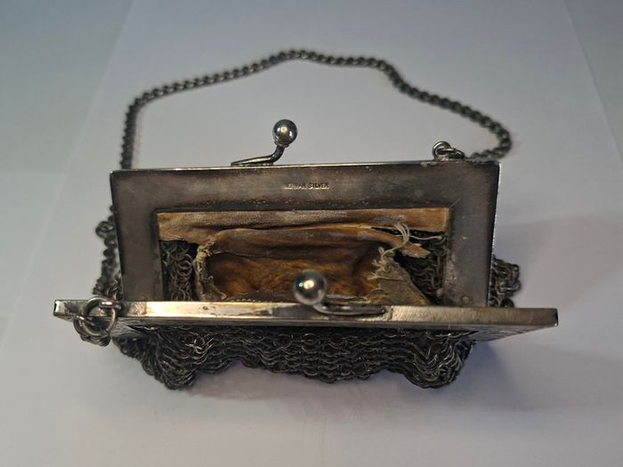 German silver chainmail mesh purse with floral clasp and chain strap
