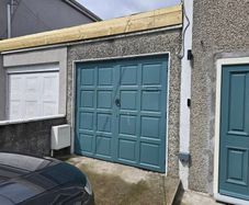 Solid mahogany wood garage doors
