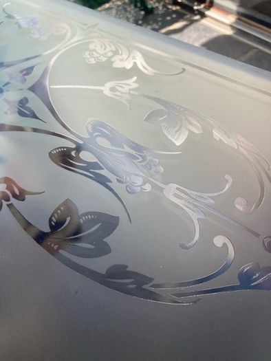 Acid etched glass panel
