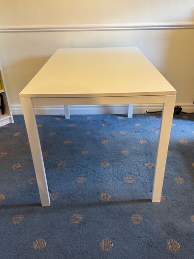 IKEA white dining table and chairs