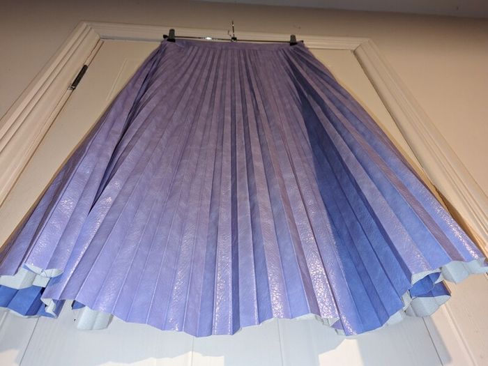 purple/lilac faux leather pleated midi skirt from River Island