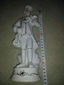 Lovely Figurine of Gentlemen with bird and violent