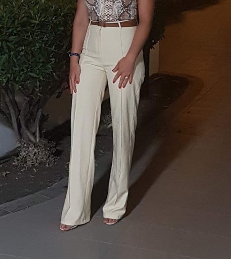 Cream flare trousers size 10