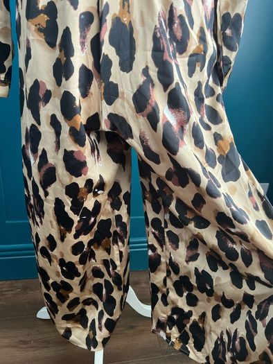 Leopard print jumpsuit. Size 8