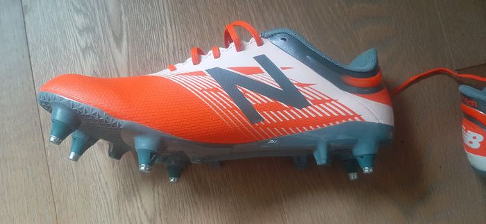 New Balance size 8 boots brand new