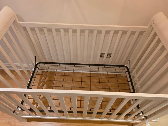 sleigh-style  baby crib and changing table